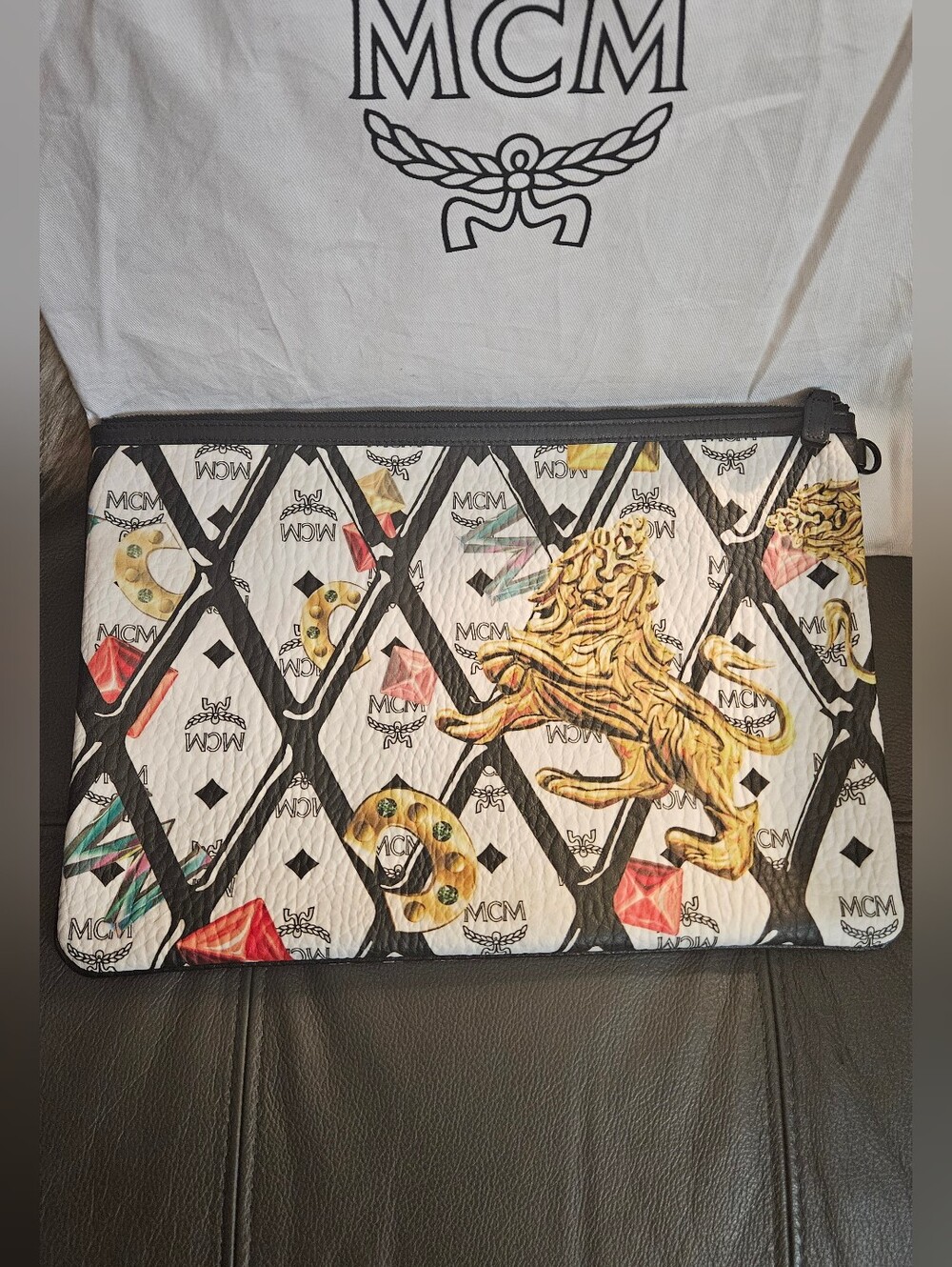 MCM White, Gold & Black Lion-Print Wristlet Clutch
